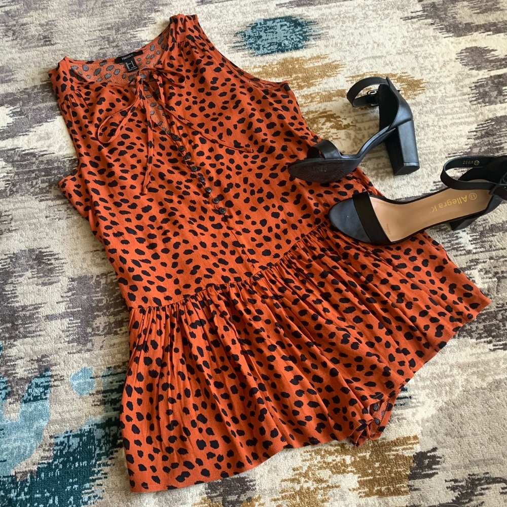 Contemporary Burnt orange romper